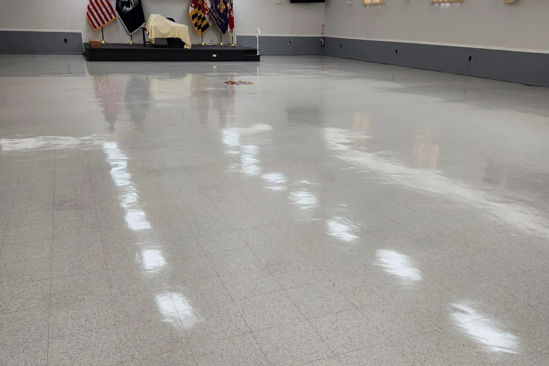 Polished commercial floor maintained by SparkClean